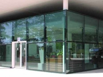 Structural sealed glass facade, partly sandblasted