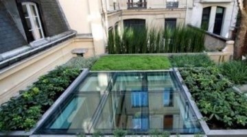 Double vitrage décalé pour une terrasse-puits de lumière