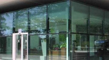 Structural sealed glass facade, partly sandblasted