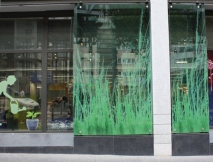 Decorative enamelled glass panels for a facade