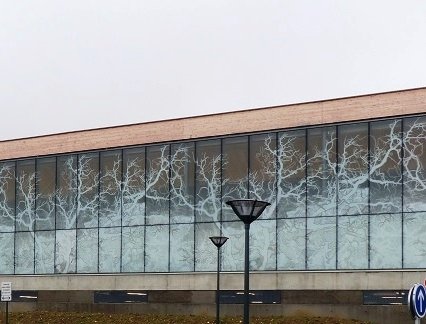 Structural sealed enamelled patterned glass facade