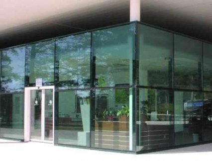 Structural sealed glass facade, partly sandblasted